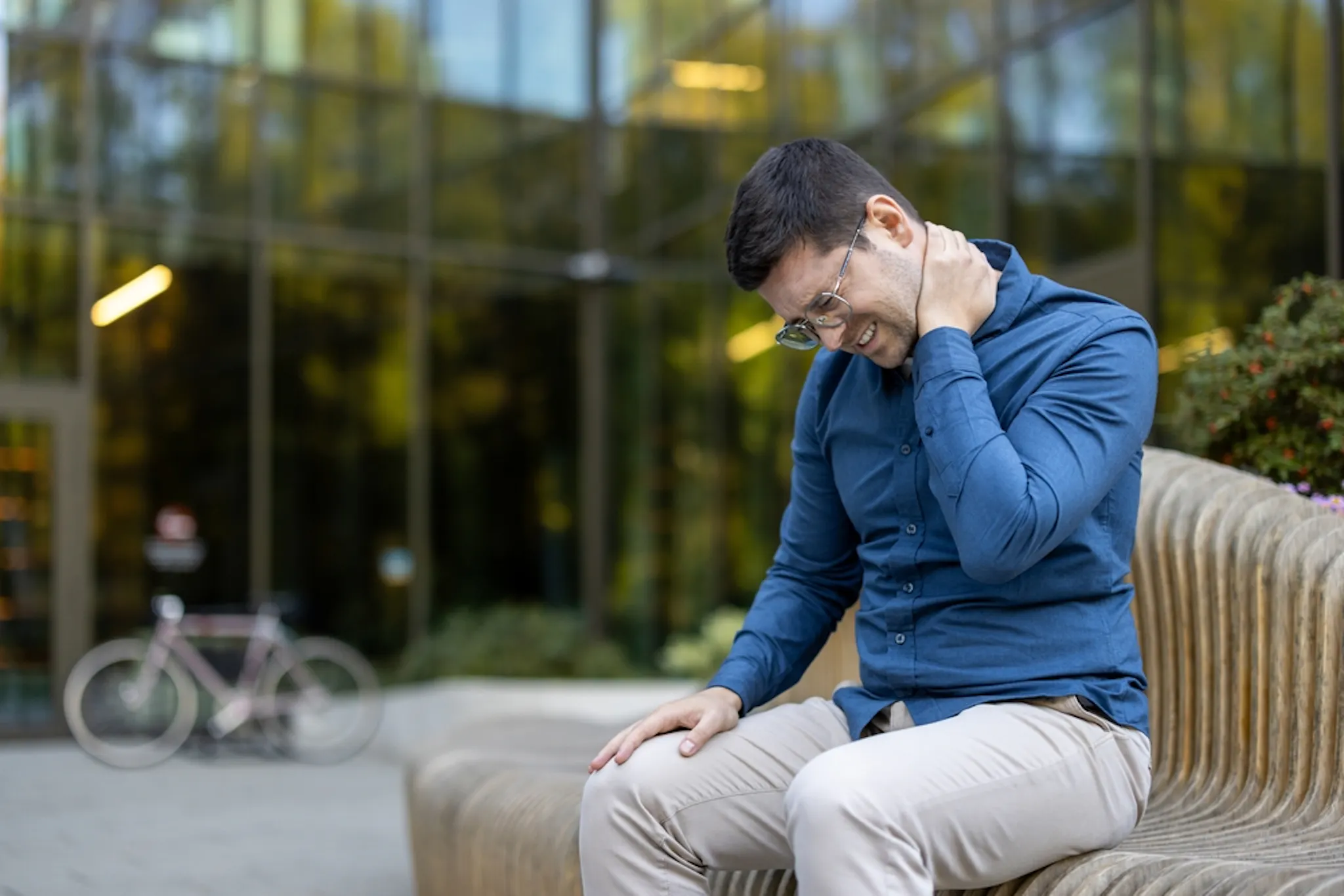 man experiencing muscle fatigue low iron