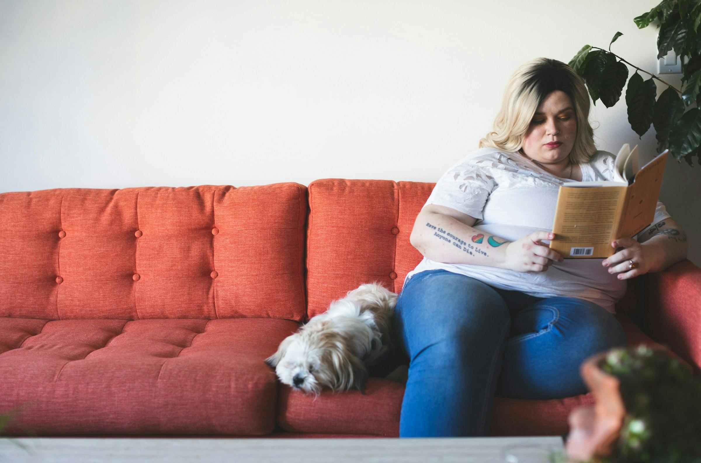 A plus-sized lady reading