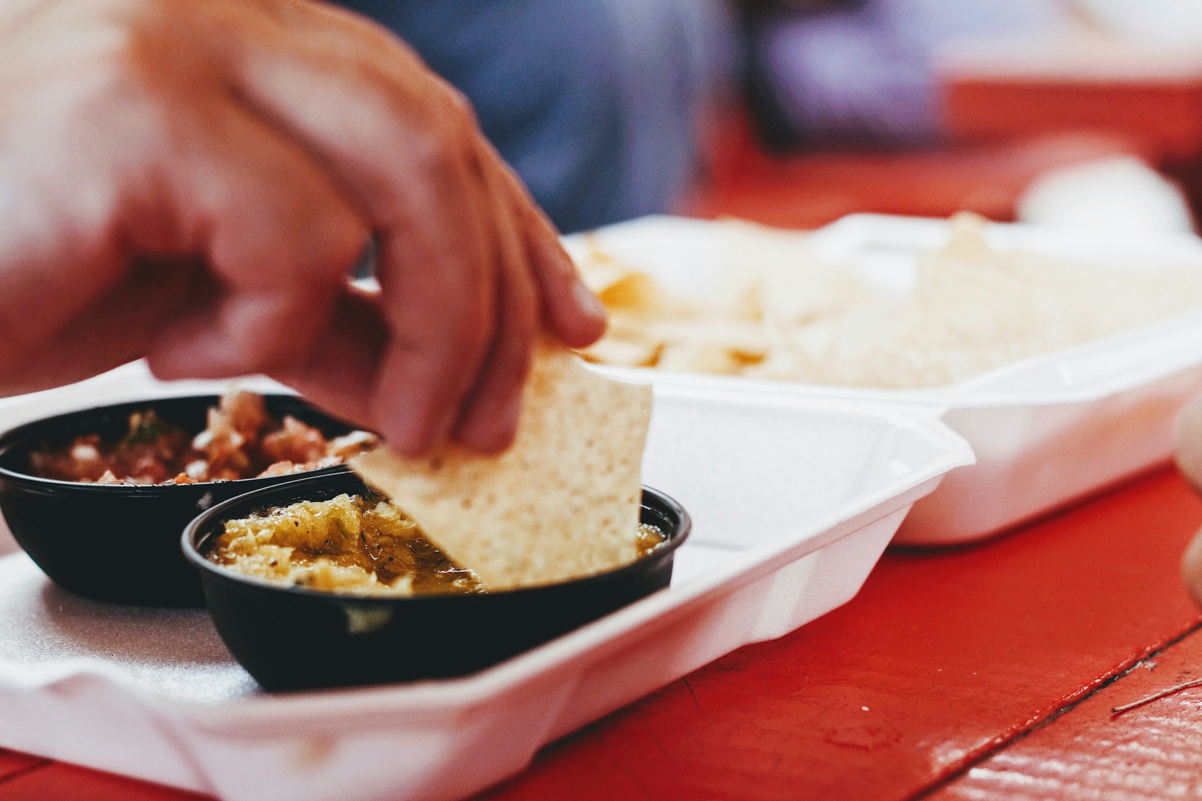 Person eating Almond flour tortillas for diabetes-friendly meals