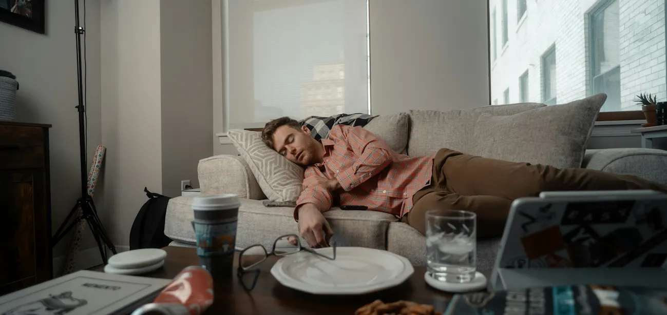 Person falling asleep after a meal