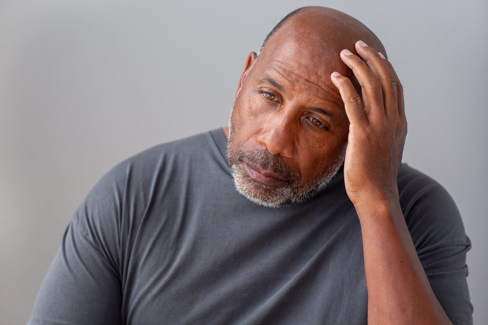 Man experiencing side effects of zepbound