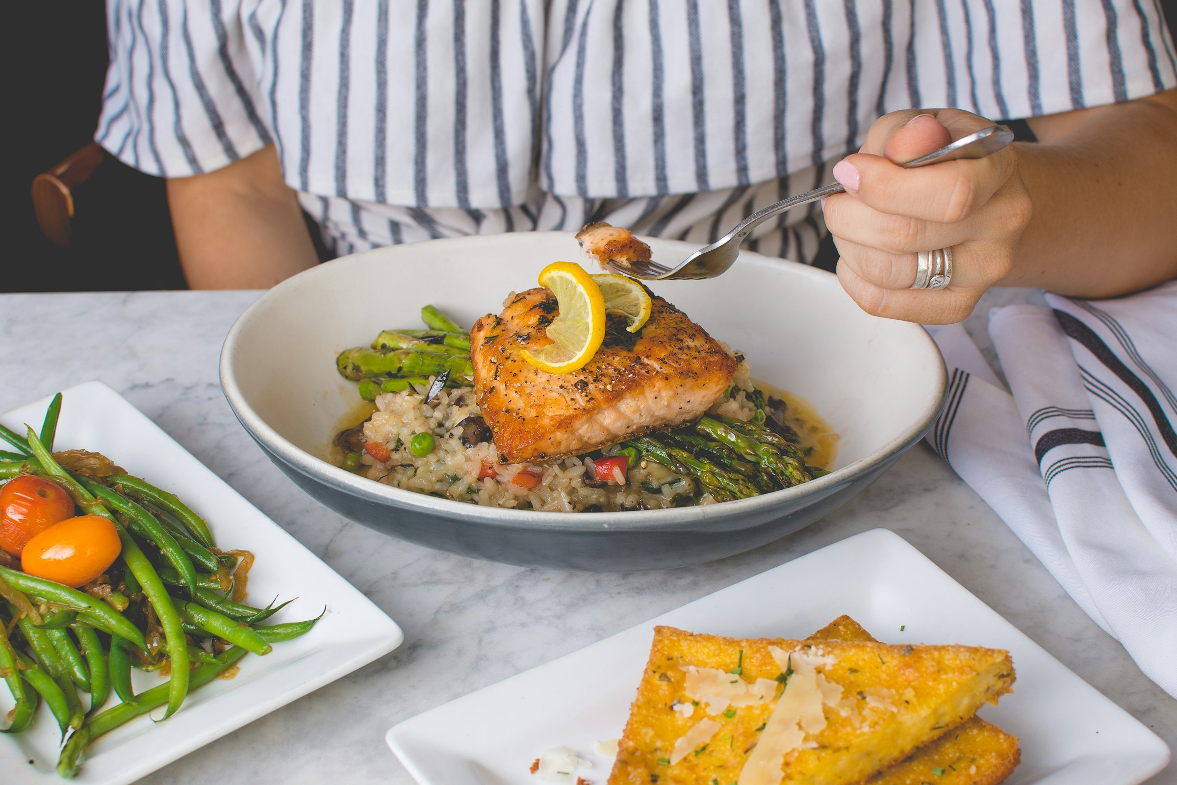 Foods high in NAD+ precursors like niacin, tryptophan, NMN, and antioxidants