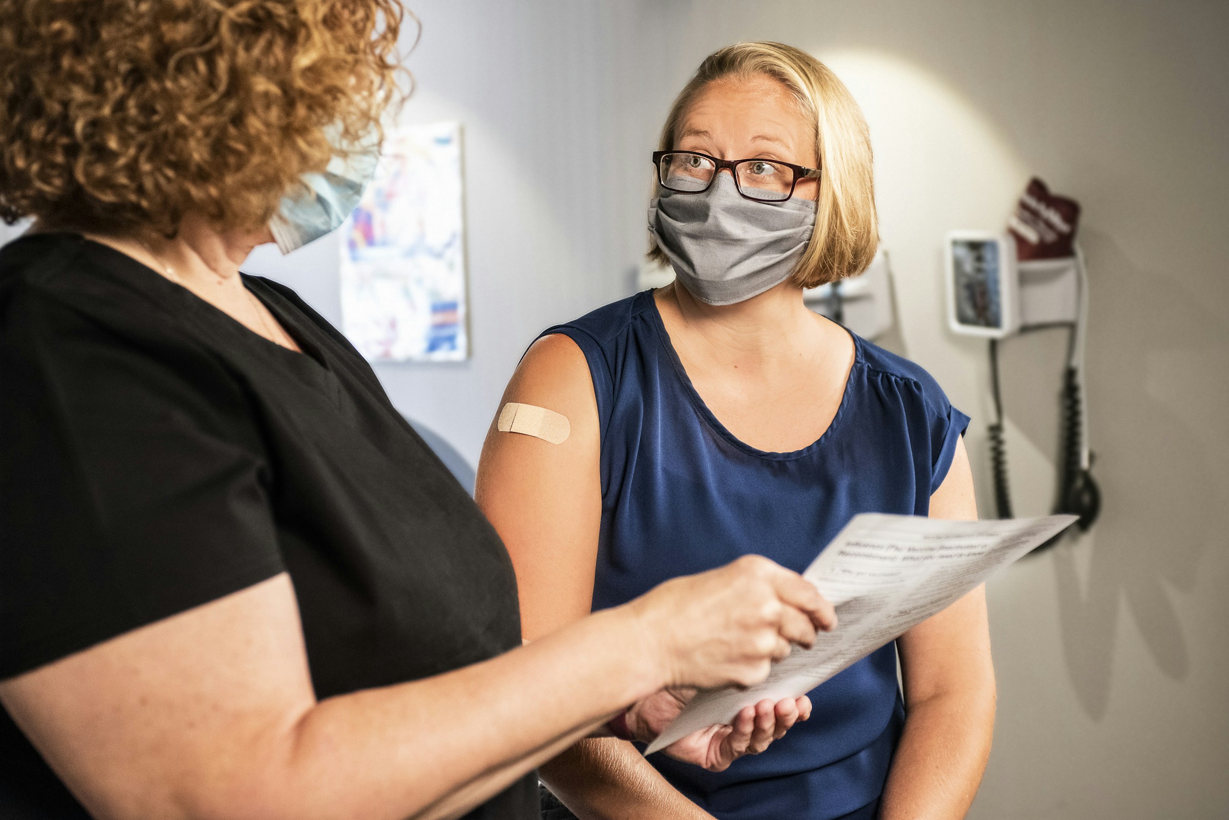 A lady getting blood test report
