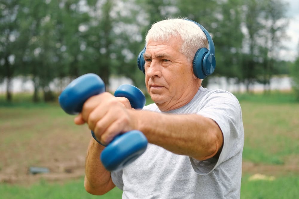 An older man doing strength training
