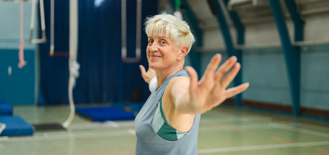 Middle-aged woman doing exercise to help with menopause symptoms