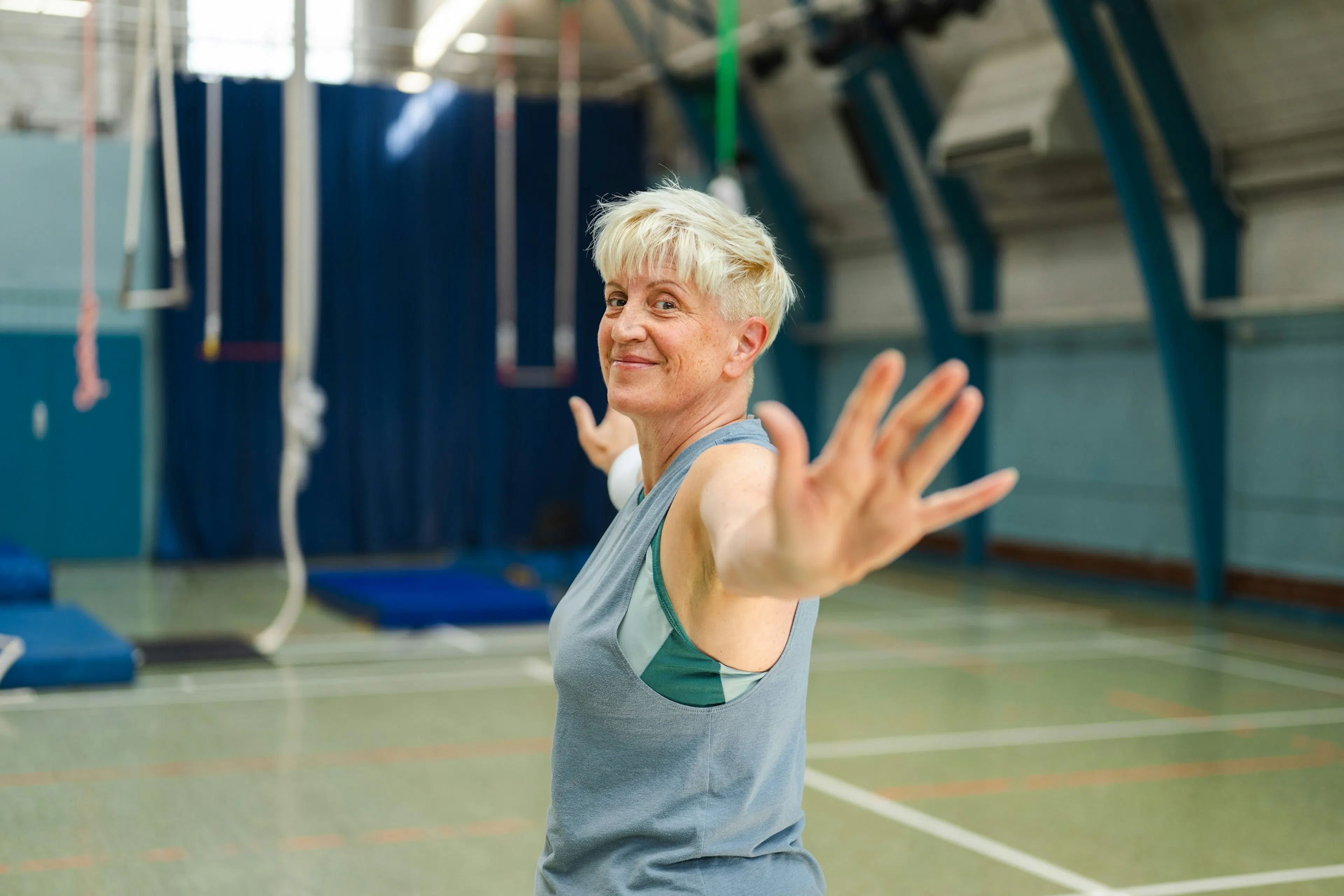 Middle-aged woman doing exercise to help with menopause symptoms