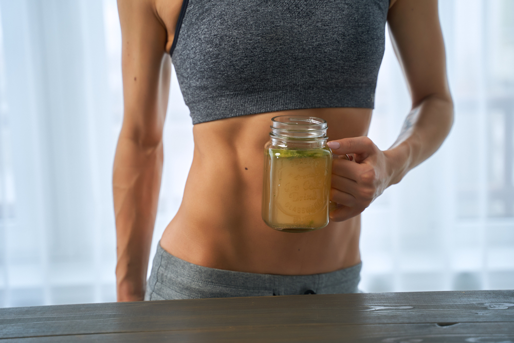 A lady taking a nutritionist recommended best bone broth
