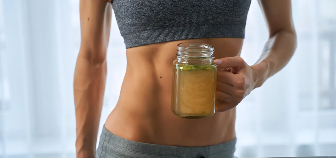 A lady taking a nutritionist recommended best bone broth