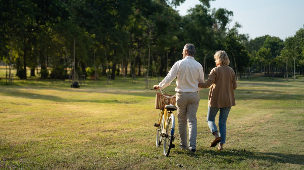 An old couple taking a walk