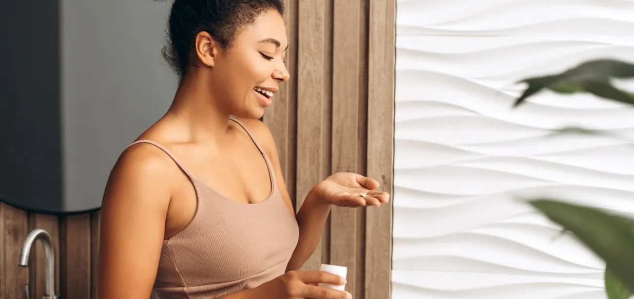A person taking magnesium supplements for weight loss