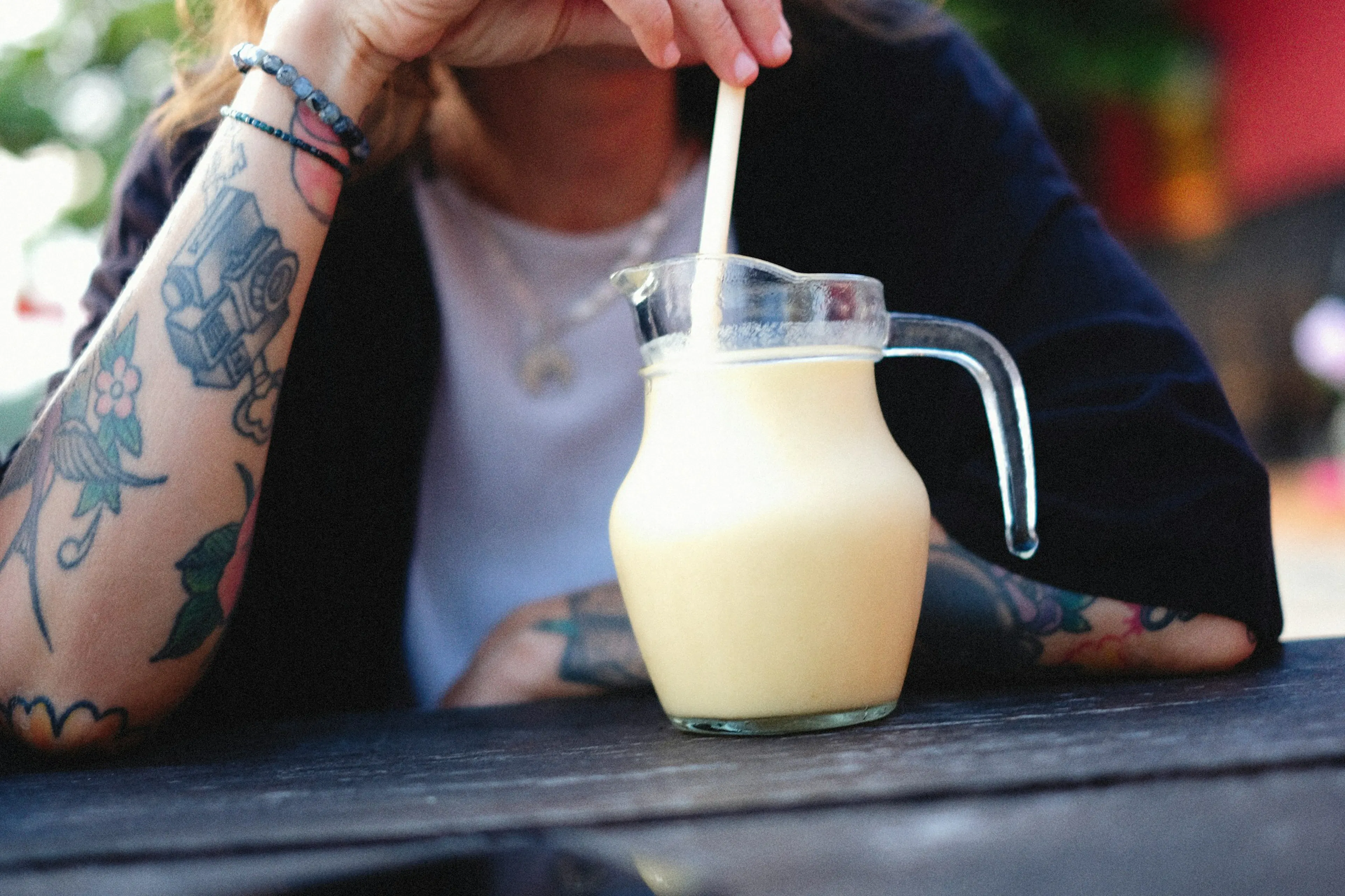 Person drinking coconut milk