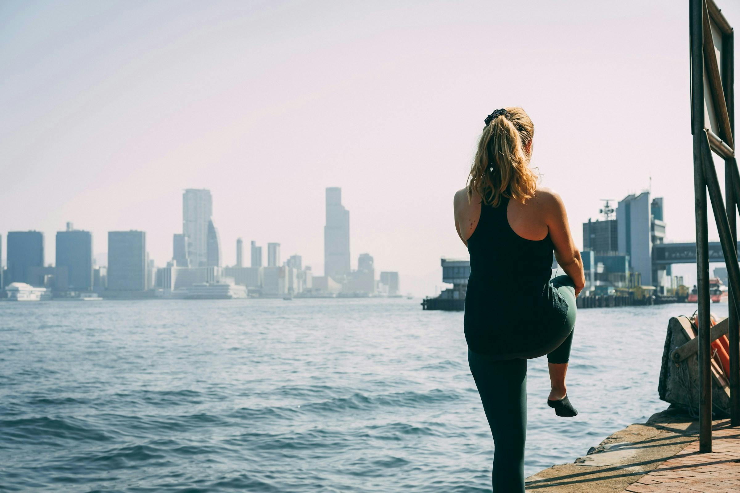A lady exercising at the beach