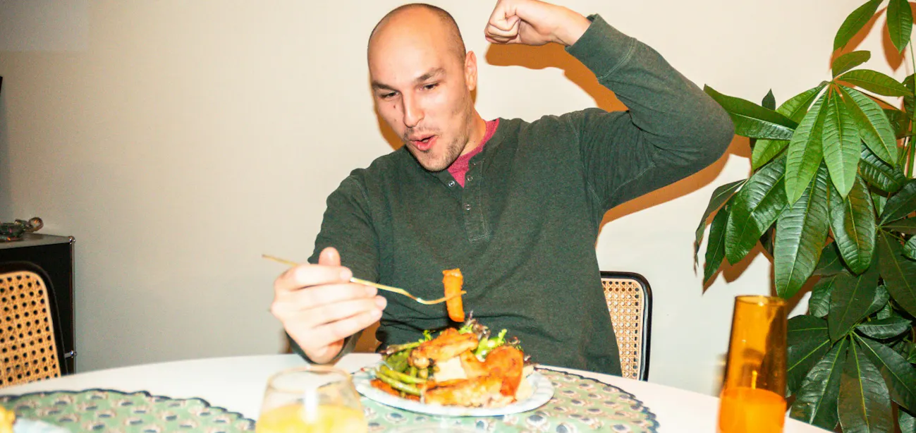 Testosterone-supportive foods including eggs, salmon, leafy greens, nuts, and olive oil