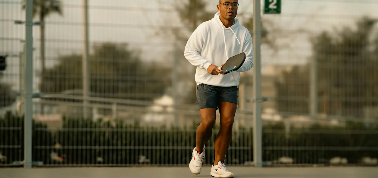 Middle-aged man exercising to improve healthspan