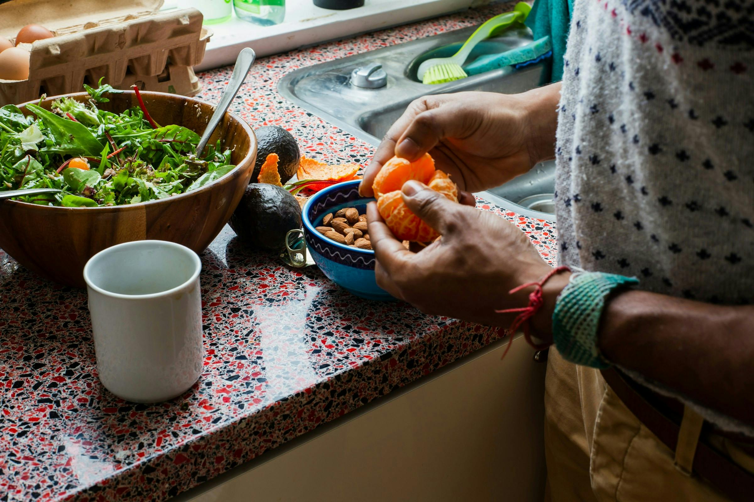Person enjoying a healthy meal for a longer wife