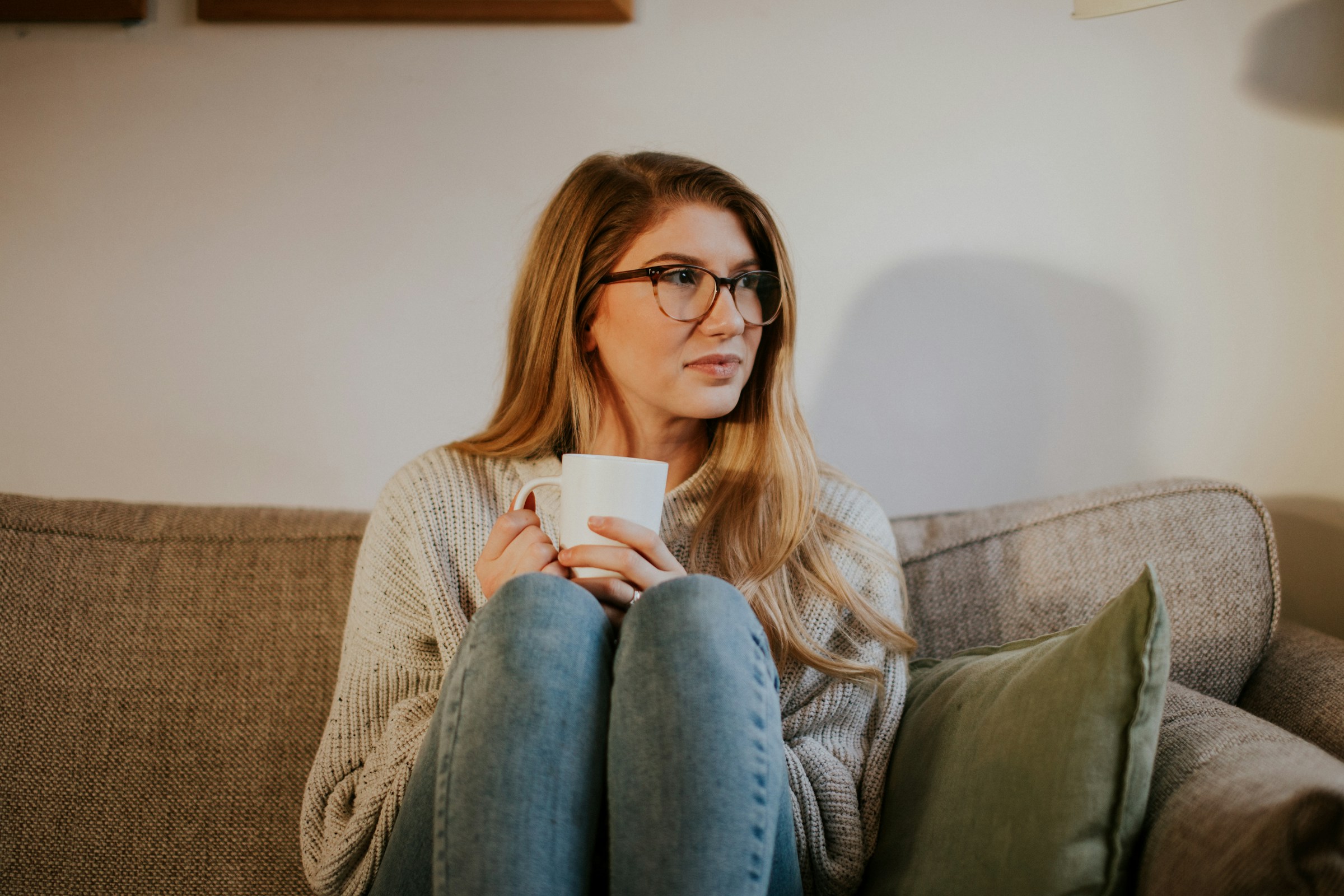 A woman having tea to help with hormone imbalances