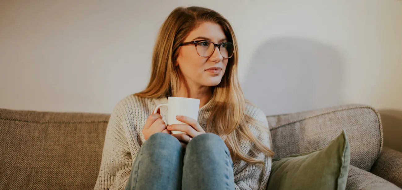 A woman having tea to help with hormone imbalances