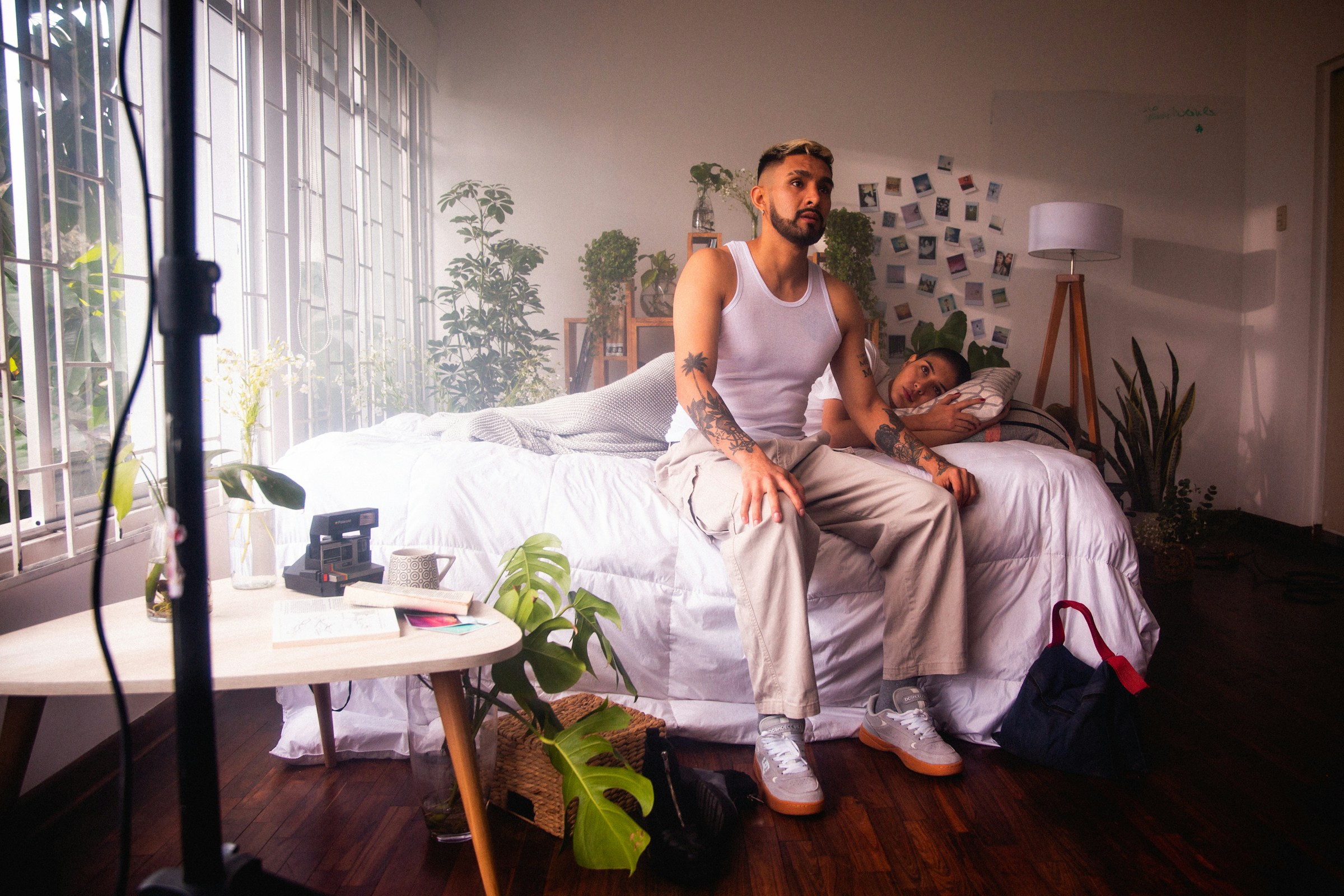 man practicing deep breathing relaxation exercise in bed before sleep