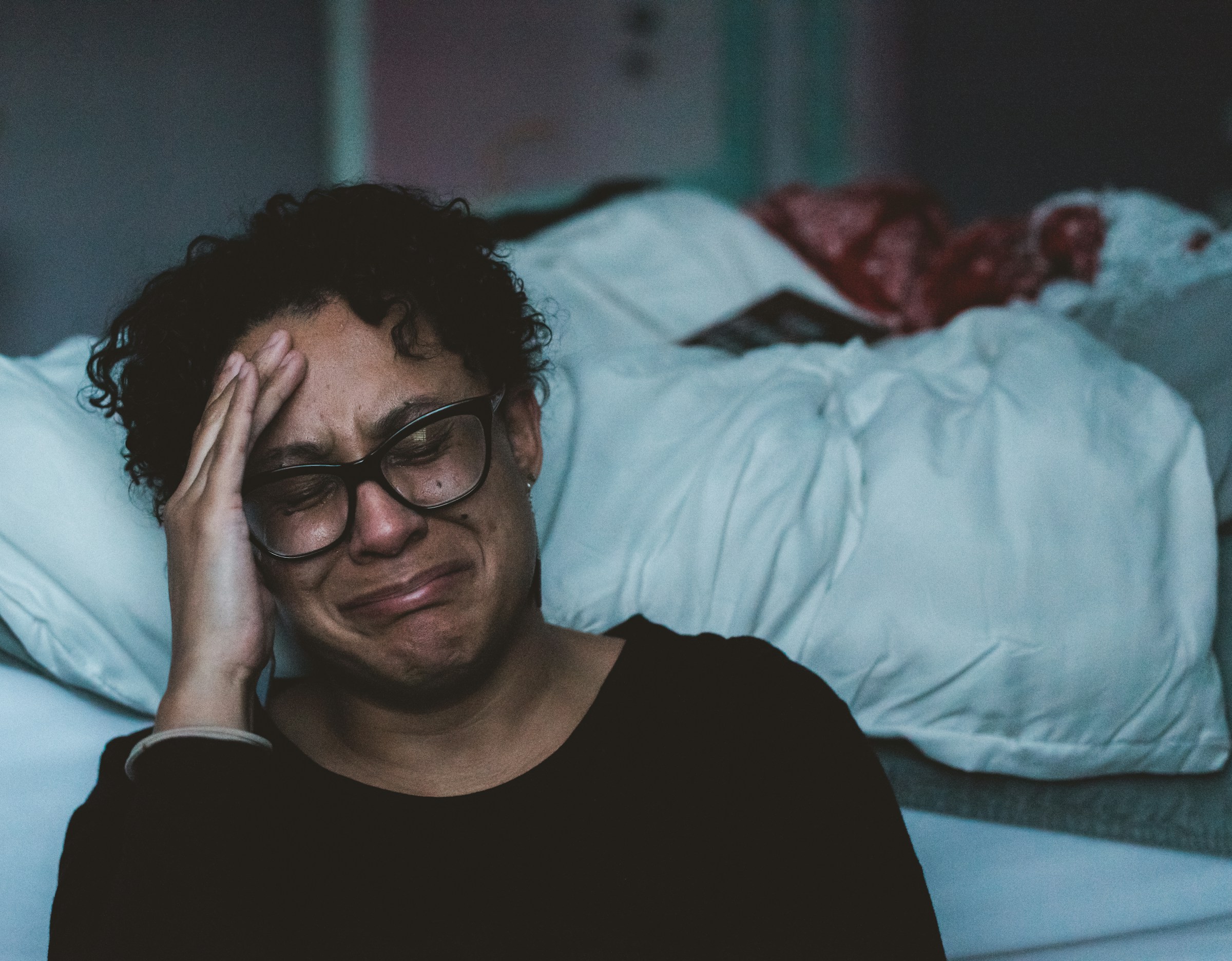 Woman in midlife tired in her room, representing menopause fatigue and low energy