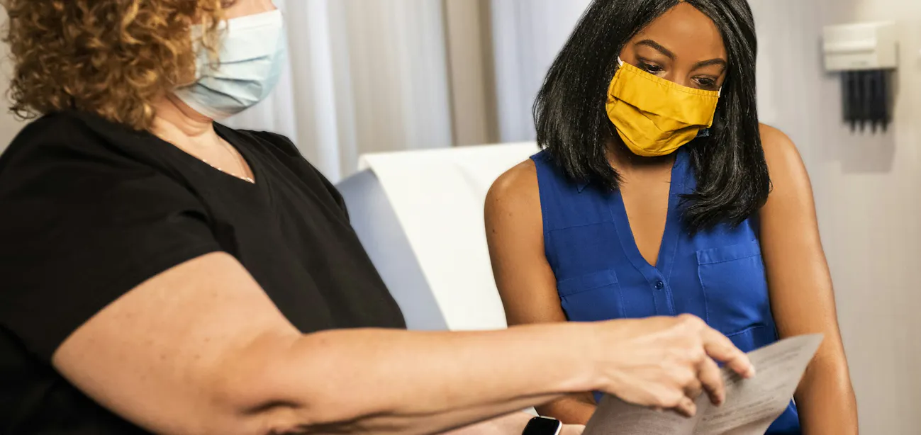 Doctor reviewing GLP-1 lab test results with patient