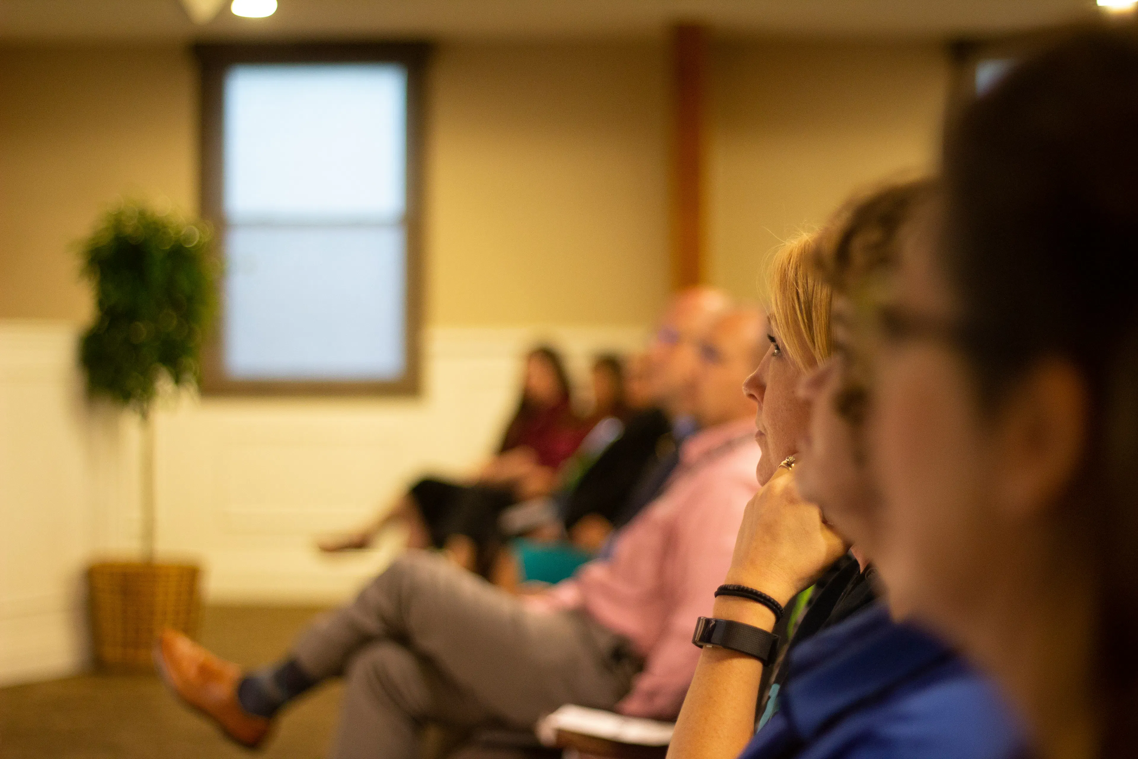 A clinician reviewing peptide drug data with a group of clinicians in 2026