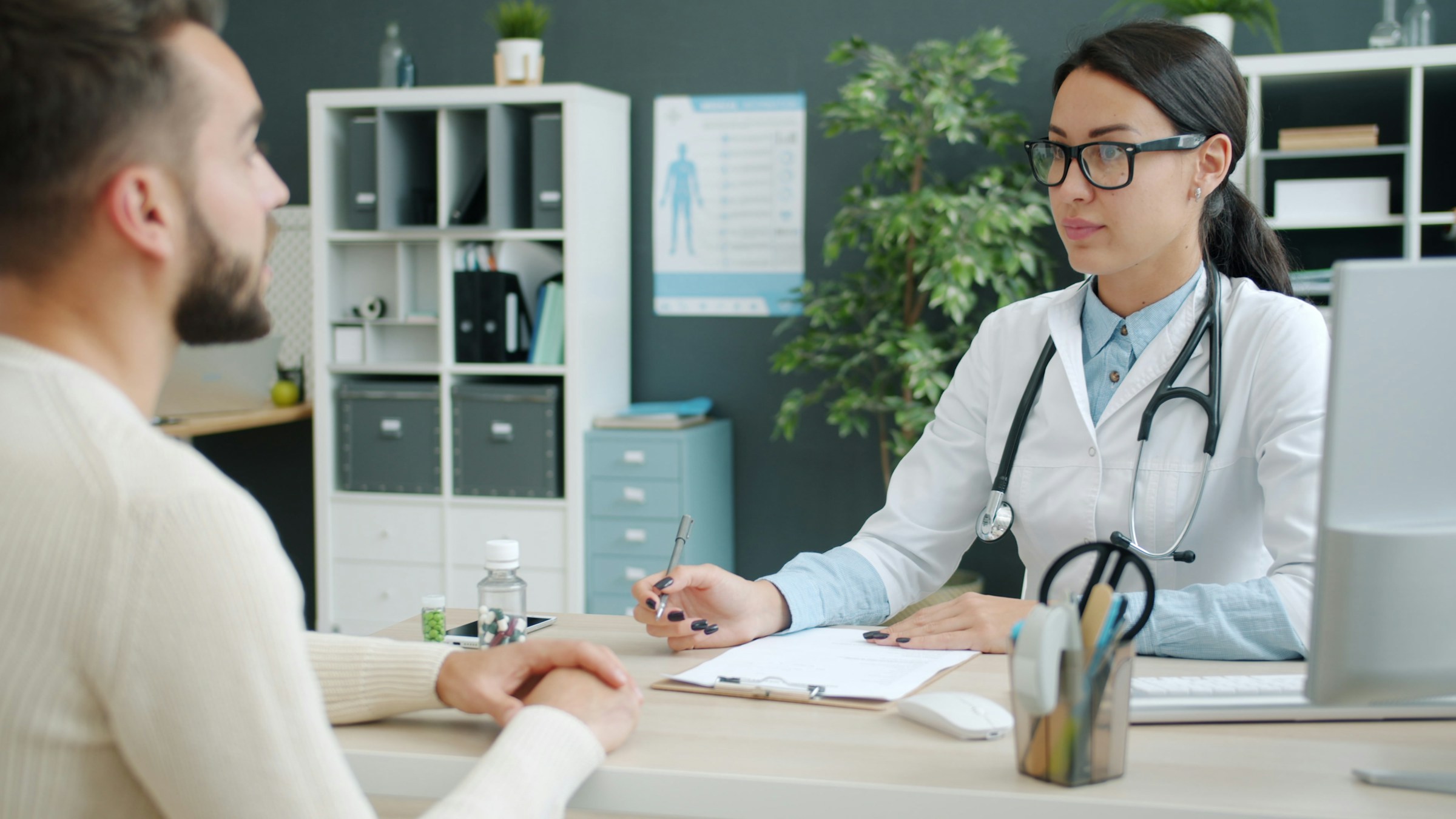 An image of a patient asking some questions about peptide to their doctor