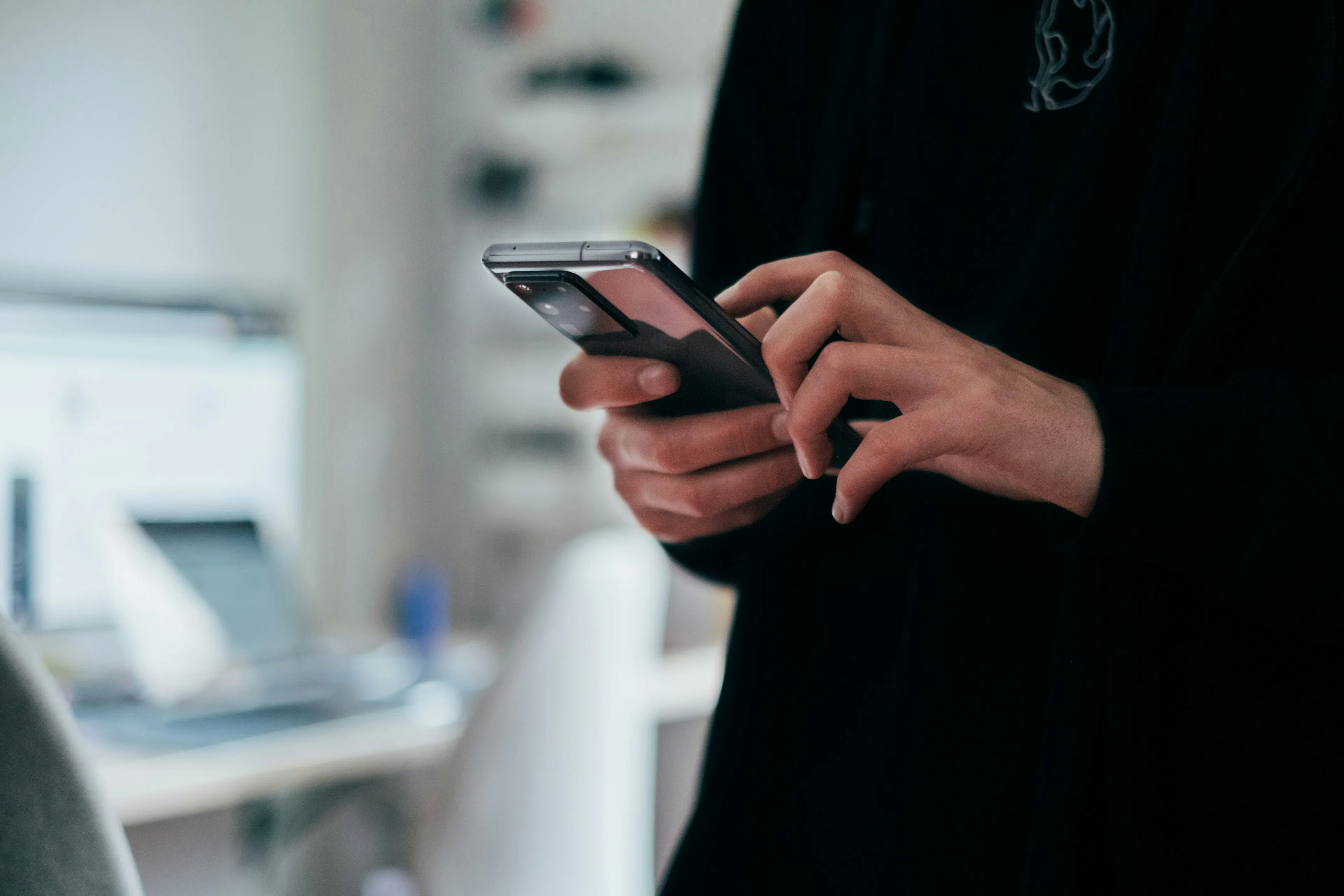 An image of a person checking peptide providers online