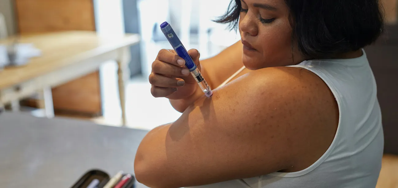 A patient administering GLP-1 hormone