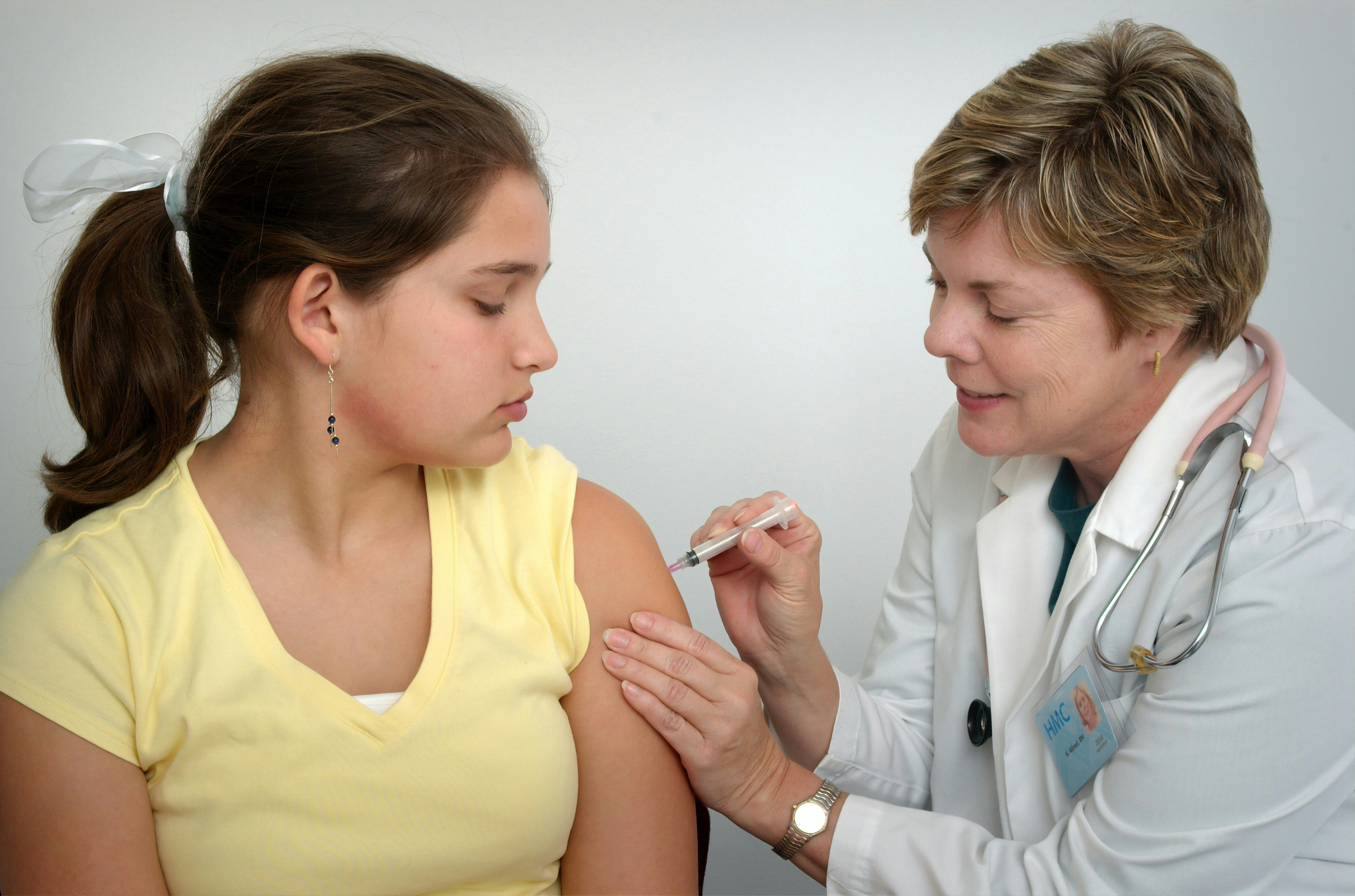 Image showing a lady with insulin resistance taking a peptide injection from her doctor