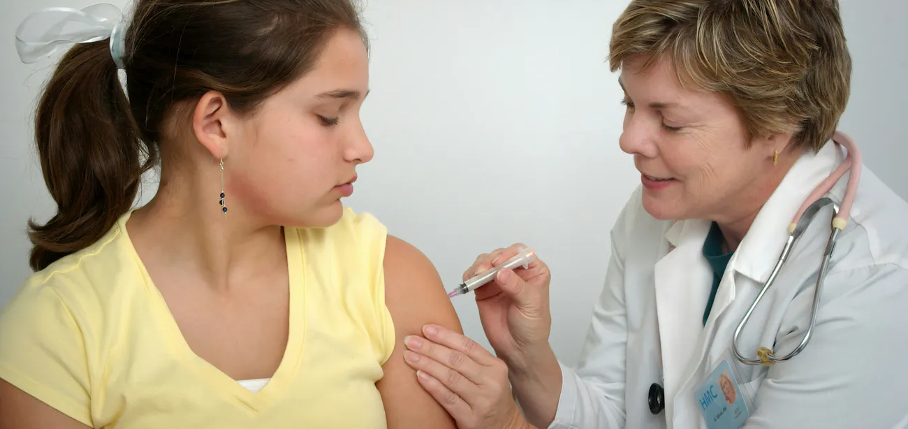 Image showing a lady with insulin resistance taking a peptide injection from her doctor