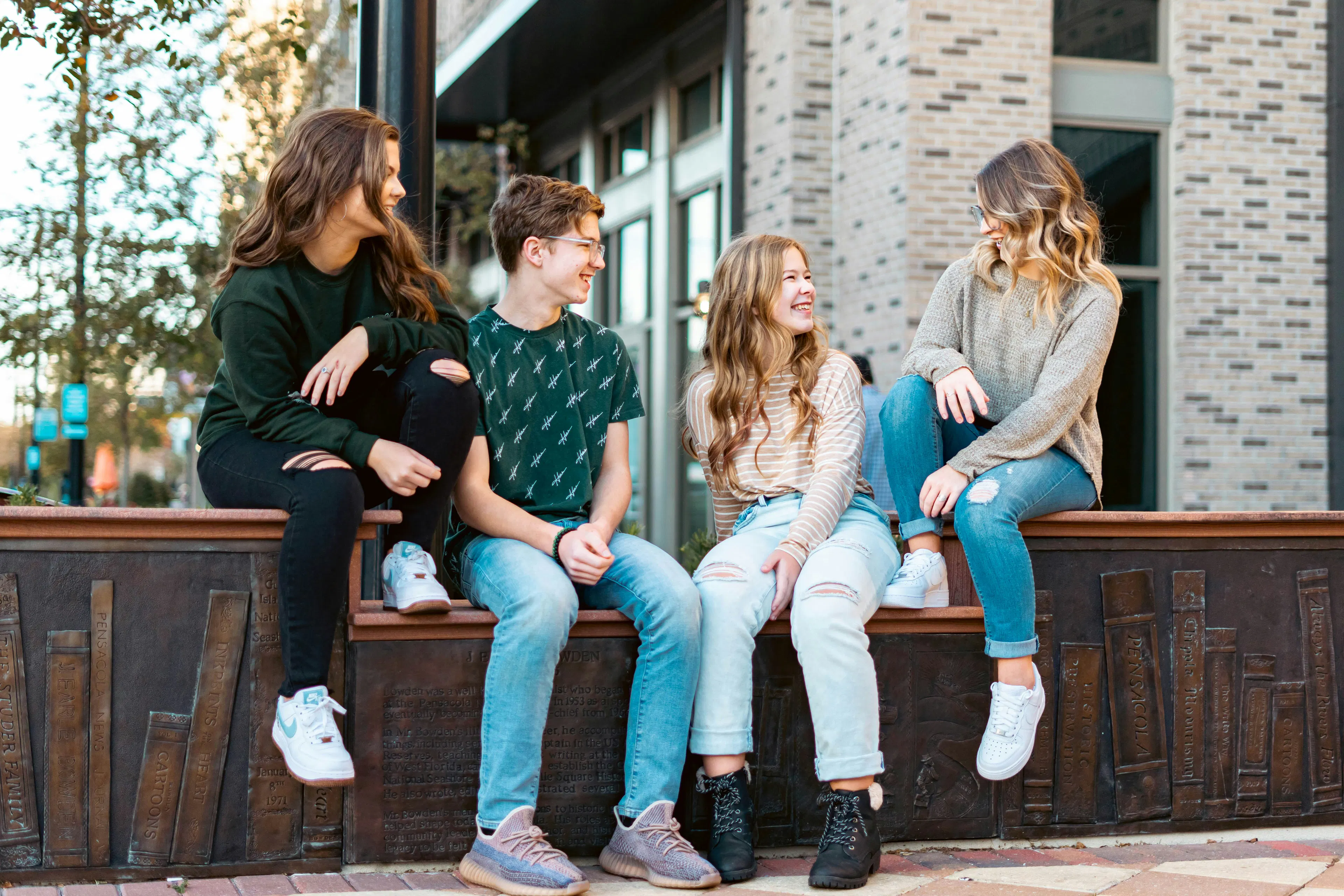 An image of a group of adults discussing peptide medications