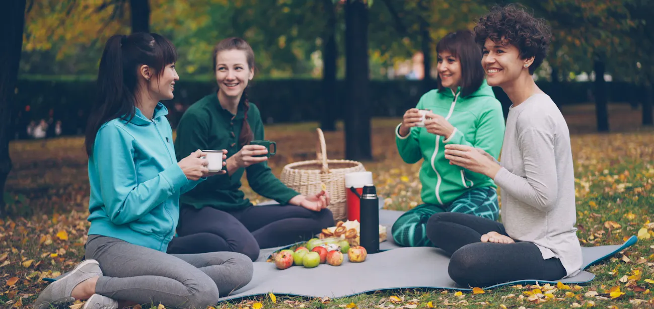 An inage showing a group of friends discussing about how to start peptide therapy