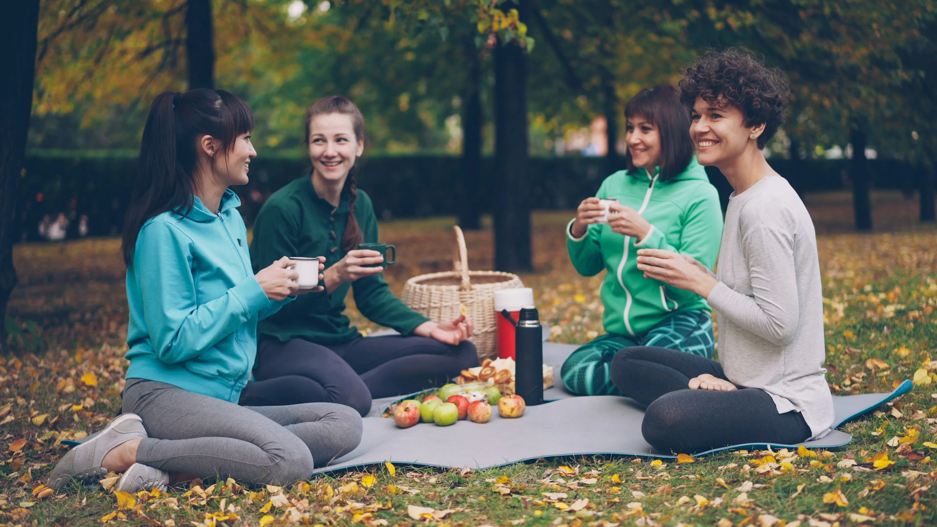 An image showing a group of friends discussing about how to start peptide therapy