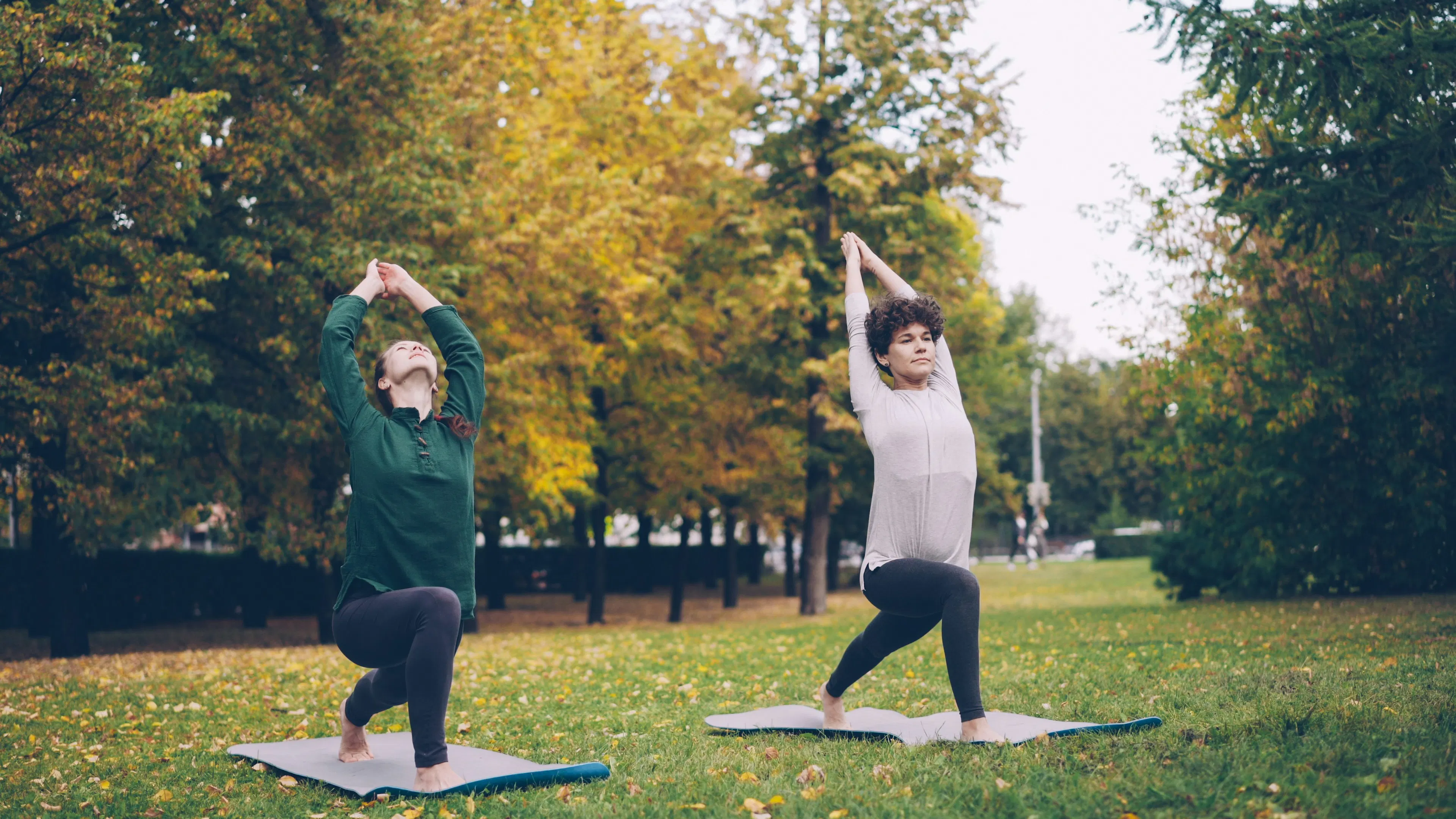 Image showing two friends stretching