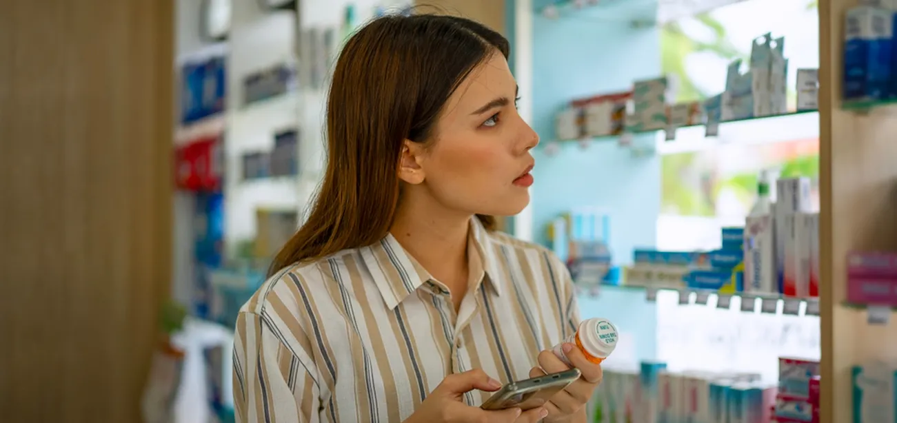 Image showing a lady trying to buy legally approved peptide from a pharmacy