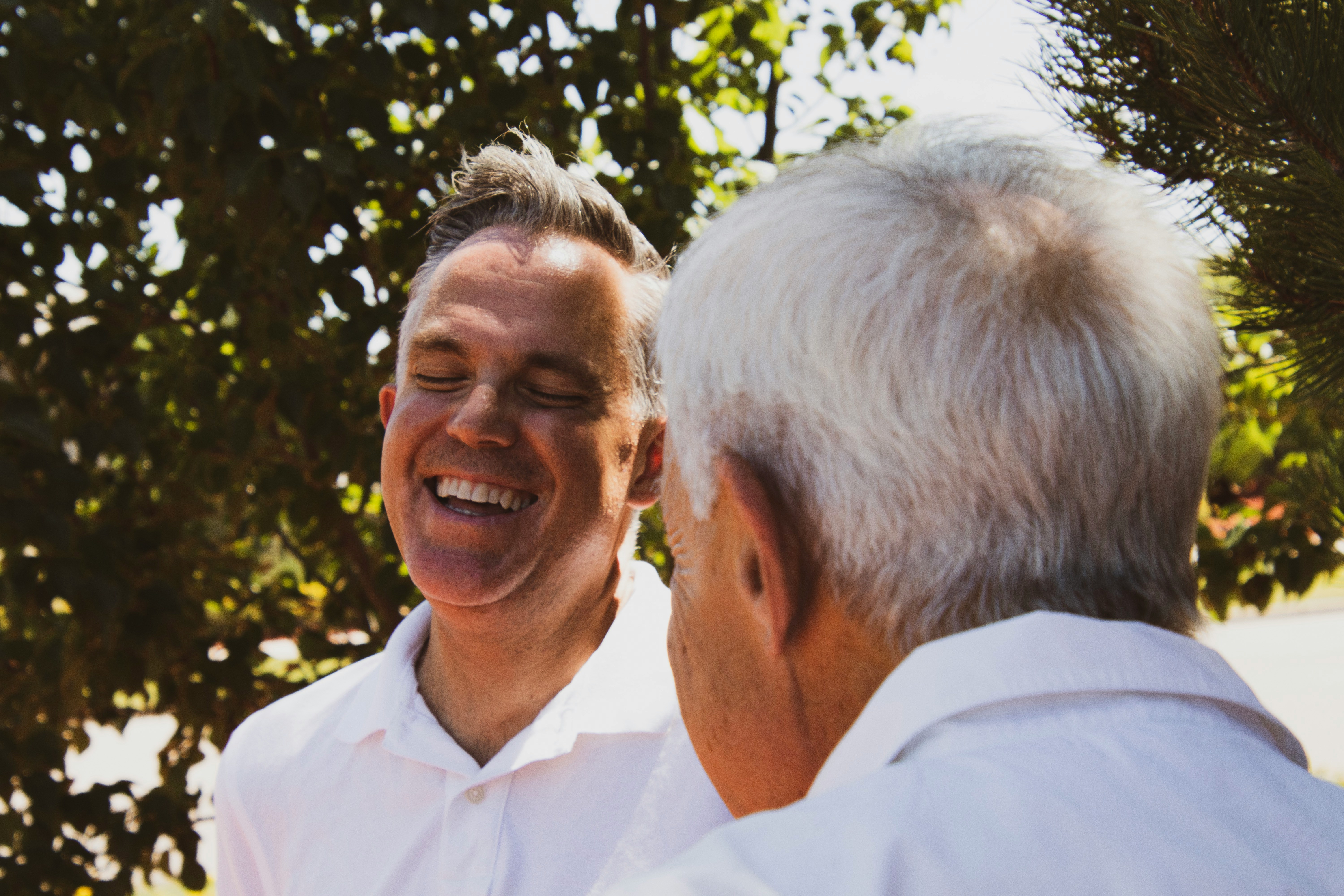 Image showing two middle aged men discussing longevity peptides