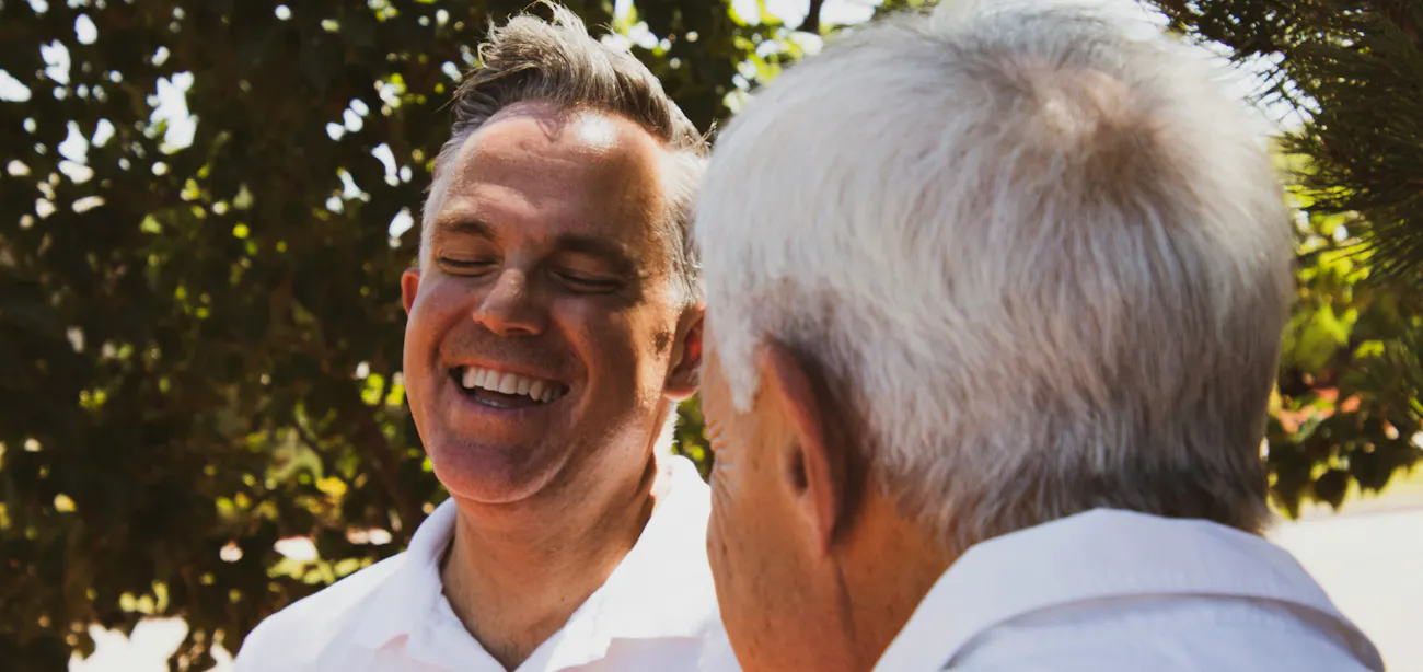 Image showing two middle aged men discussing longevity peptides