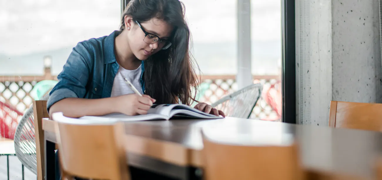 An image showing a lady reading, who uses Semax and Selank peptides to improve cognition