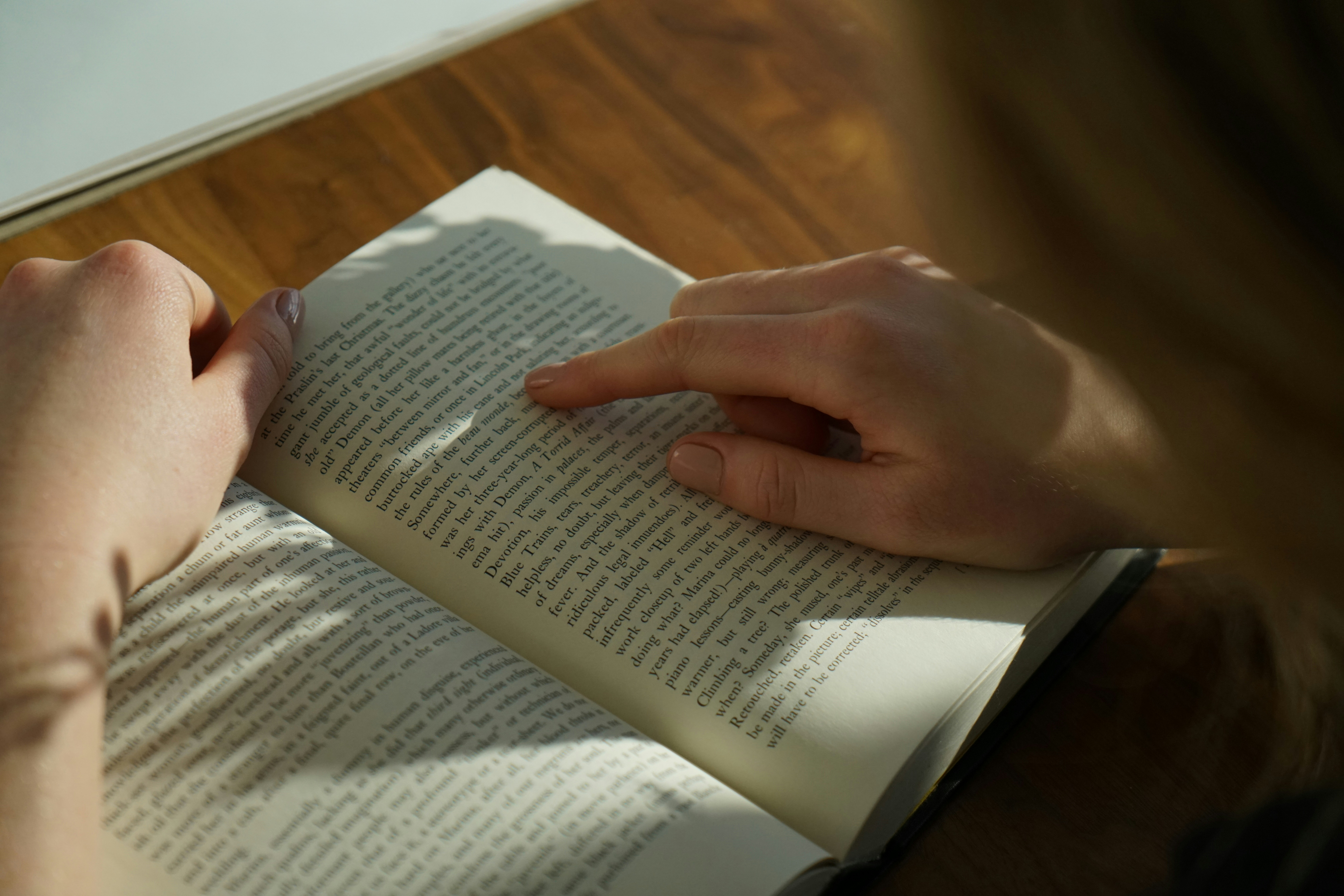 An image showing a person reading a peptide therapy glossary to understand more about peptides