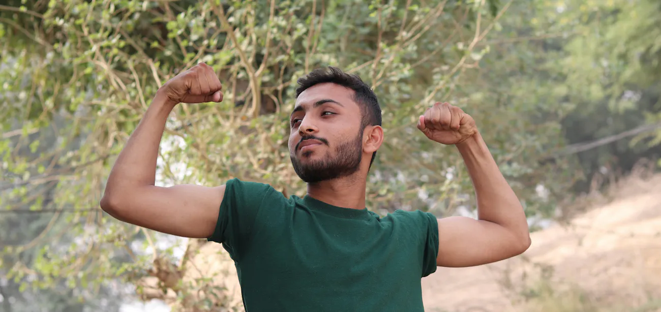 An image of a person flexing his muscle