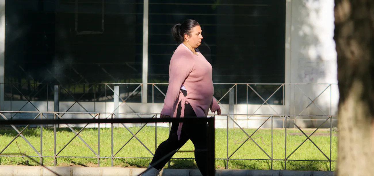 An image of a person taking a walk
