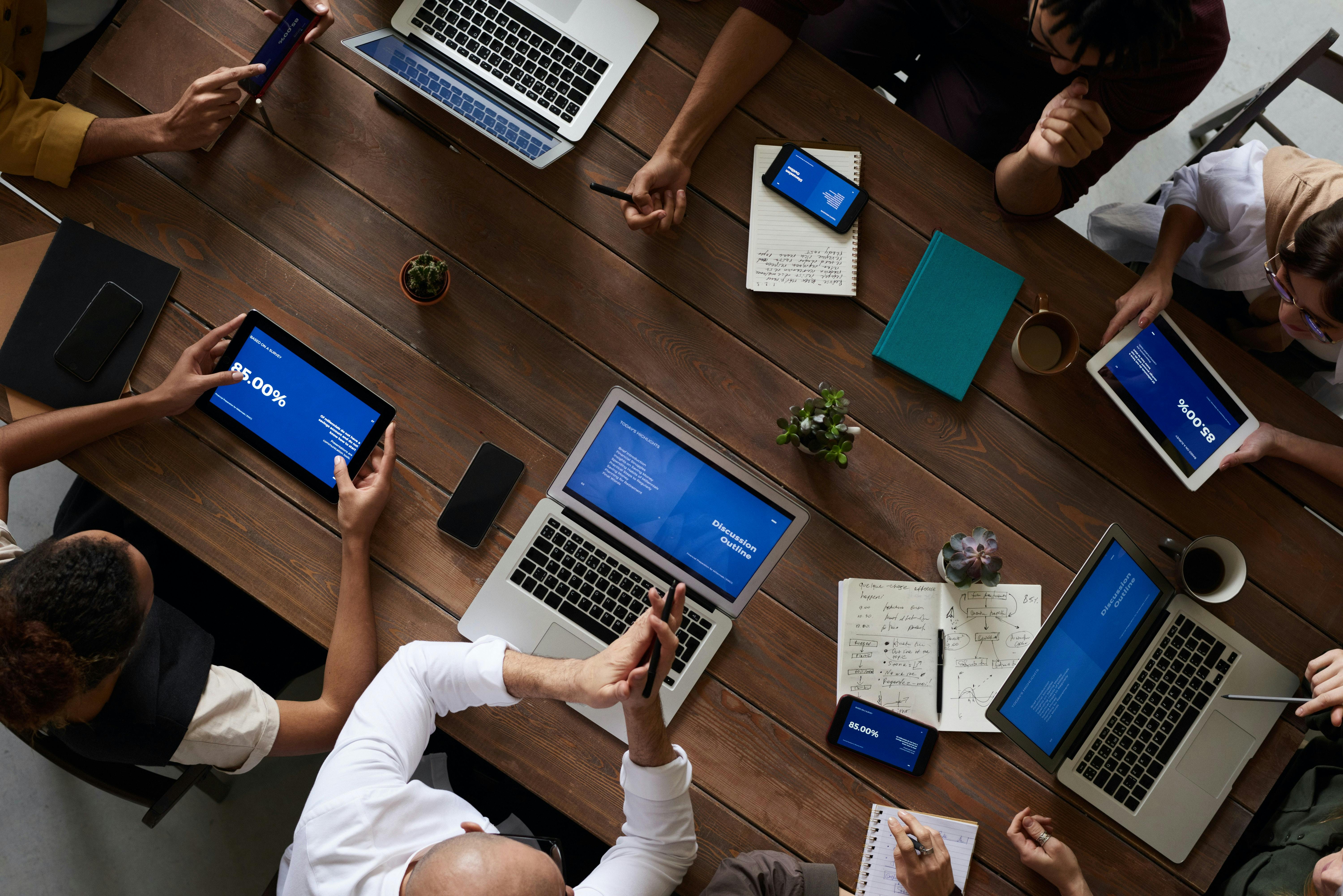 Work team working together around a table