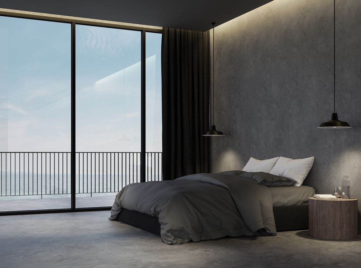 Schlafzimmer in Betonoptik. Innenräume Malermeister Müller und Sohn.