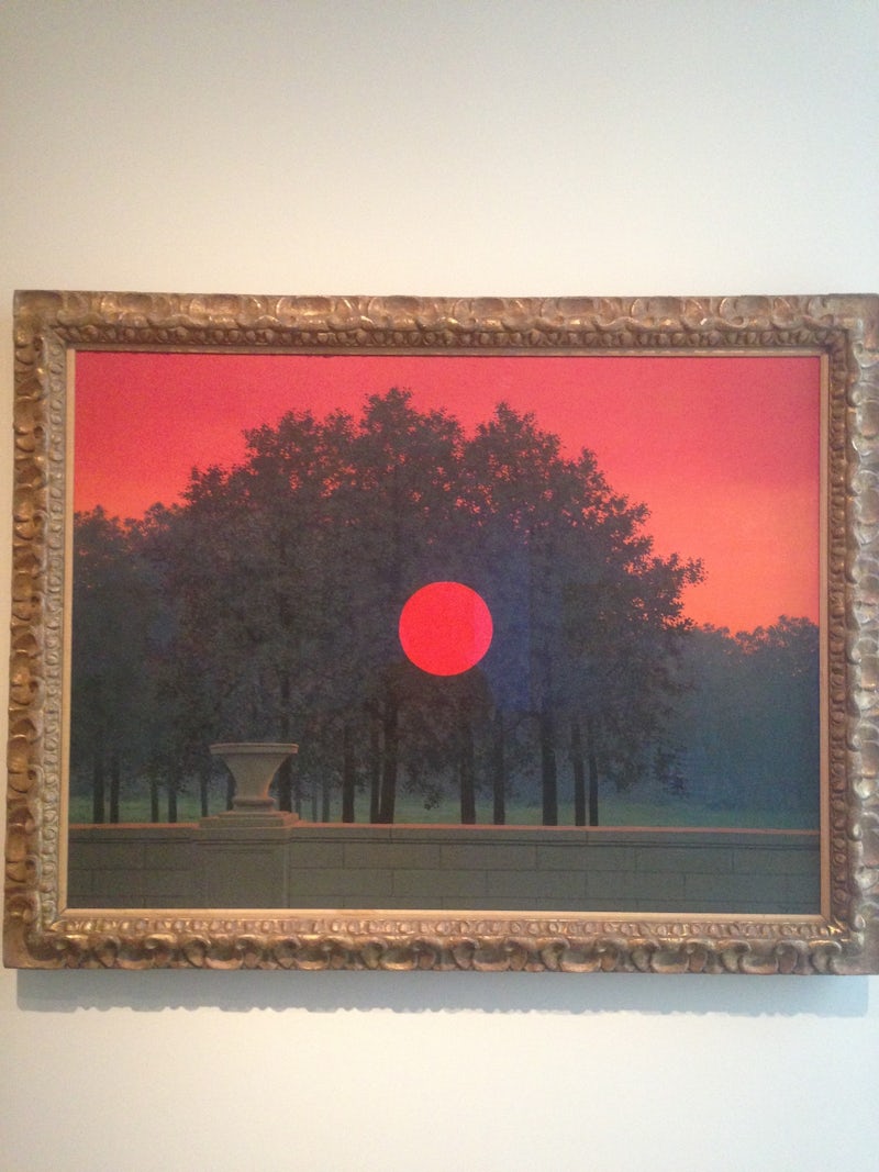 I like that the sun is on the wrong side of the trees in René Magritte’s 1958 ‘‘The Banquet.’’
