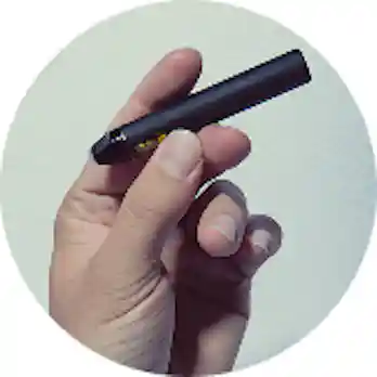 Image of hand holding vape