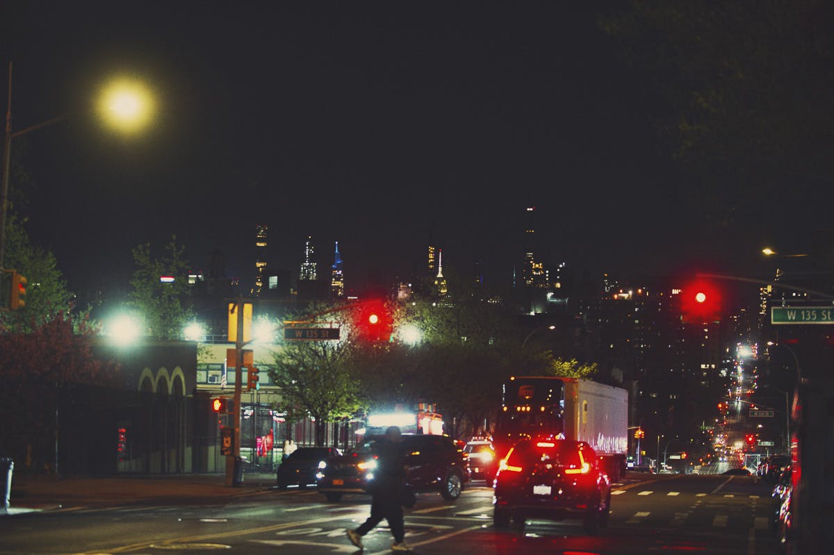 NYC streets facing downtown at nighttime