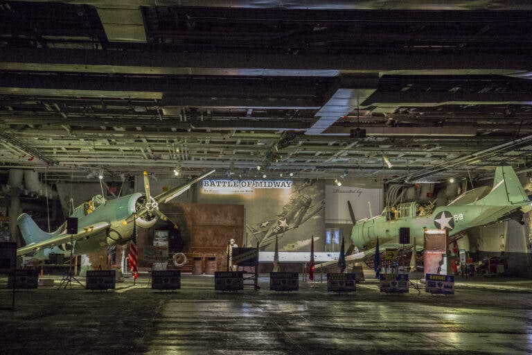 View of Battle of Midway theater and aircraft on the Hangar Deck