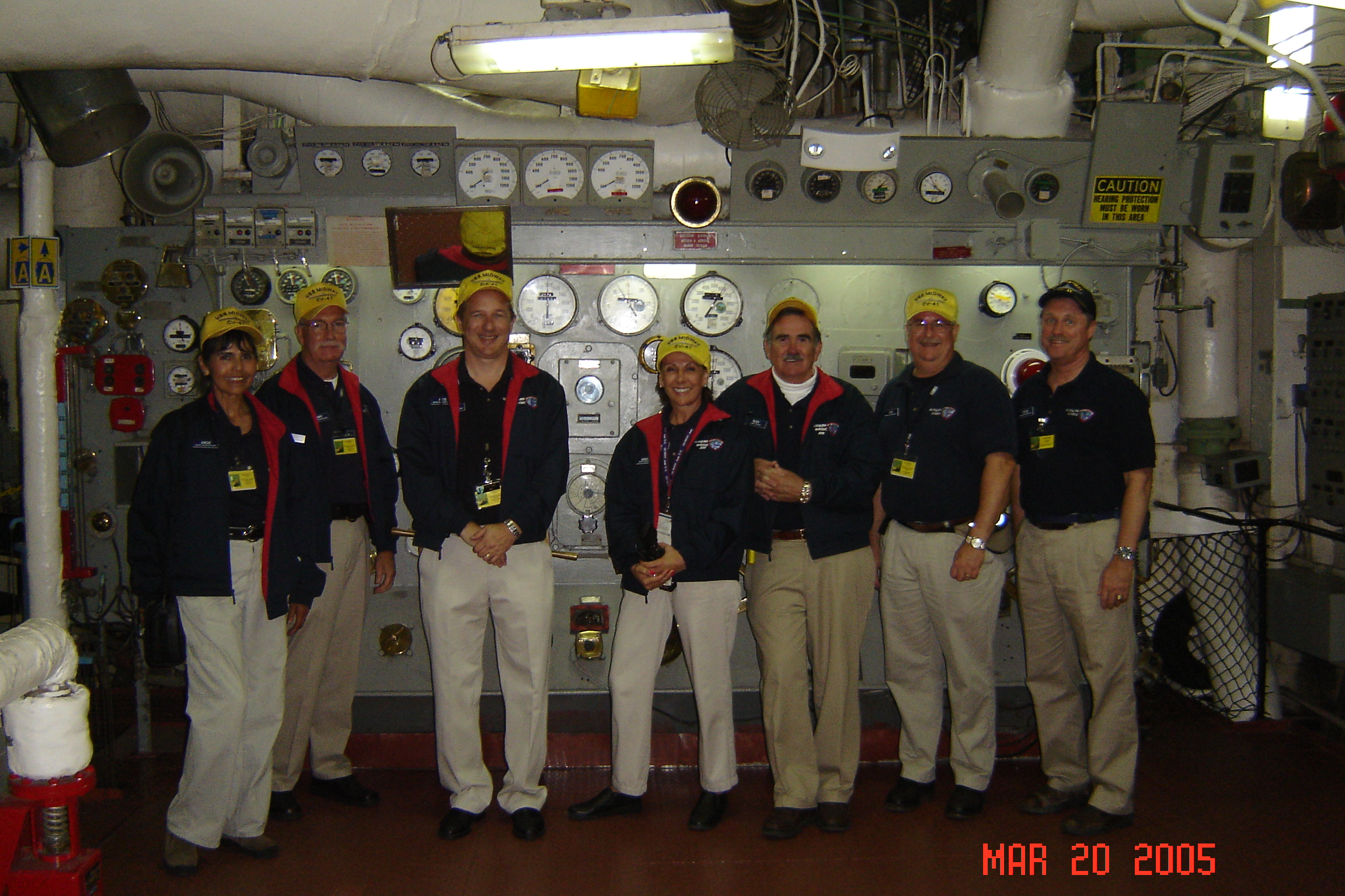 Docents in the Engine room the night before opening in 2005.