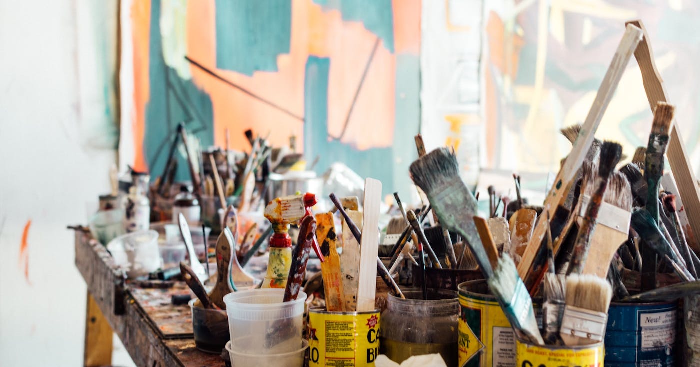 Paintbrushes in a workspace