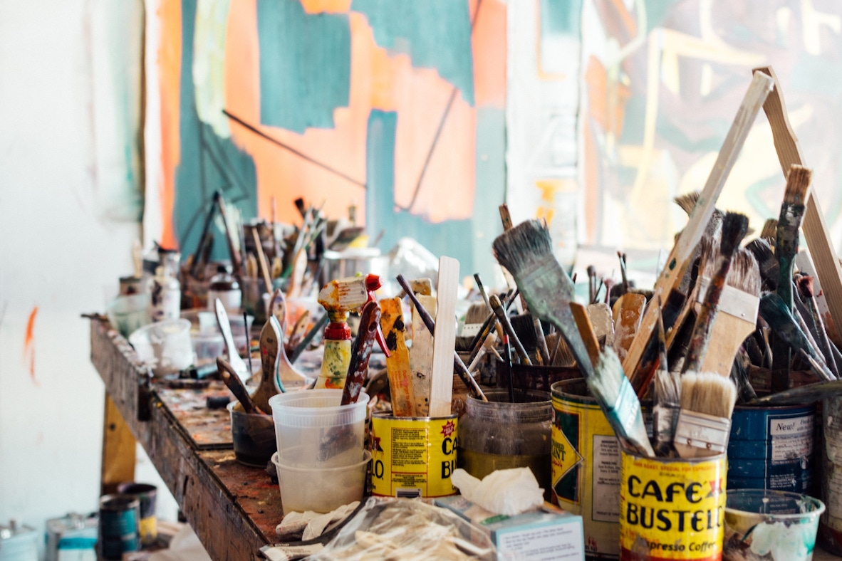 Paintbrushes in a workspace